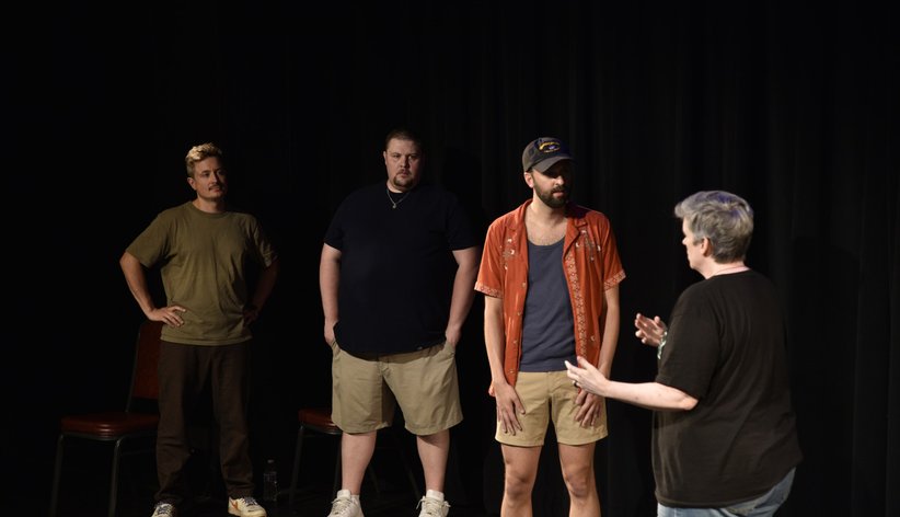 Four improvisers on stage at the Adrienne