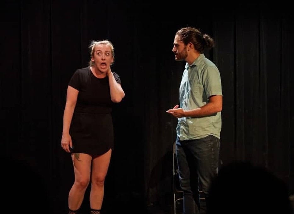 Actors rehearsing an improv routine