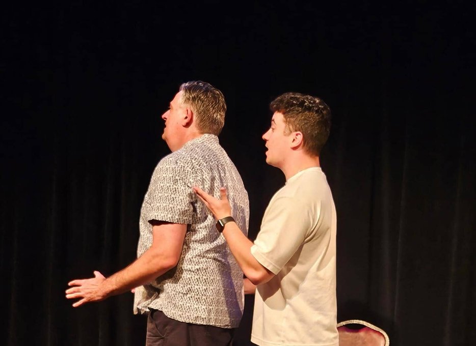 Actors rehearsing an improv routine