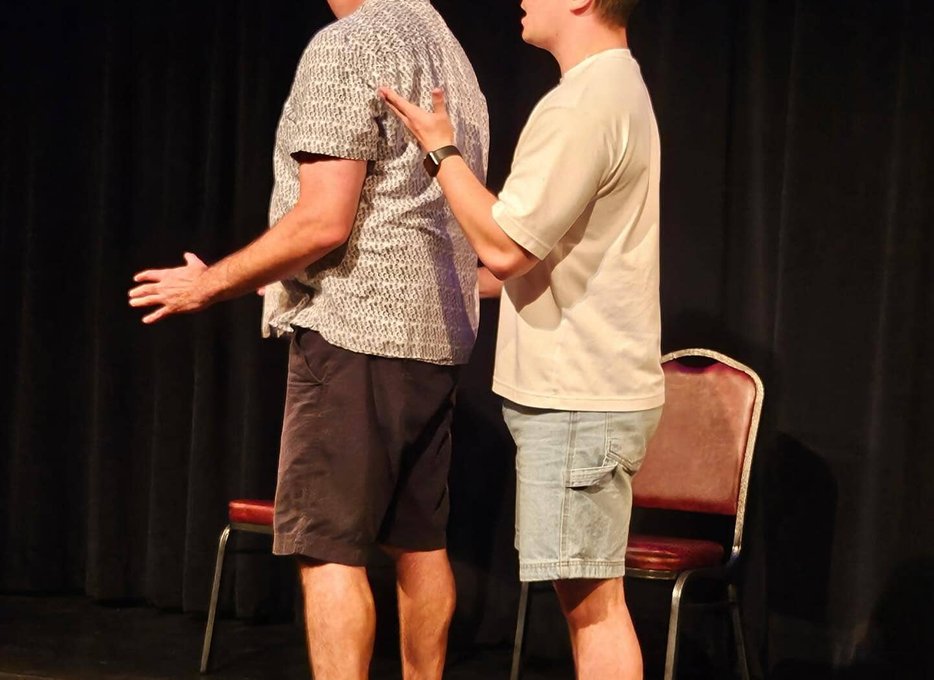 Actors rehearsing an improv routine